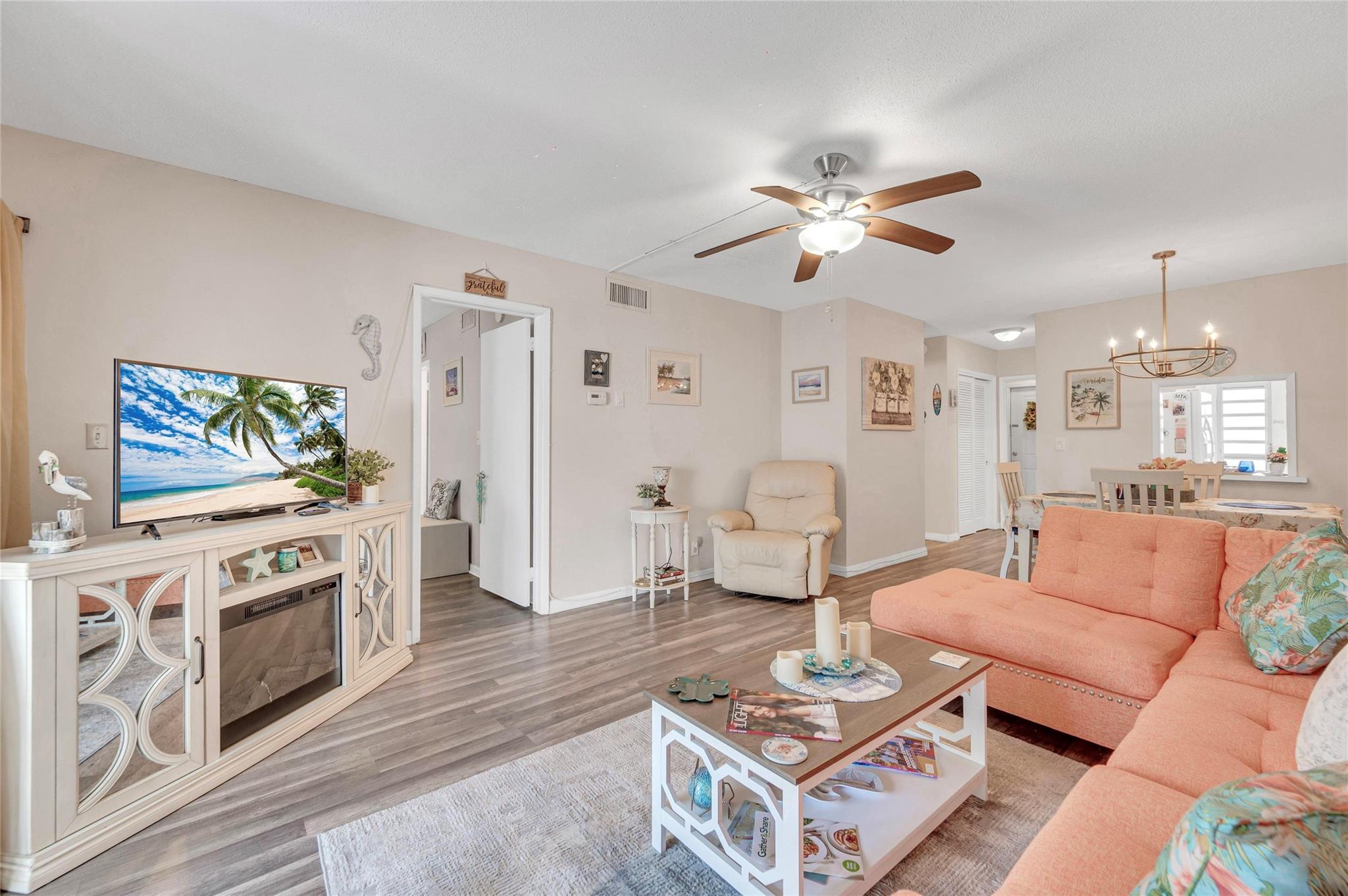 Nestled in the heart of Lighthouse Point, one of South Florida's most sought-after neighborhoods, awaits this stunning 2 bed 2 full bath condo. Perched on the 2nd floor with elevator access, this residence exudes modern elegance with its wood floors, fresh paint, and upgraded bathrooms, newer 2022 AC unit. Immerse yourself in the convenience of nearby amenities including a clubhouse, pool, and a bustling shopping plaza. Don't miss the opportunity to make this move-in ready haven yours. Schedule your viewing today