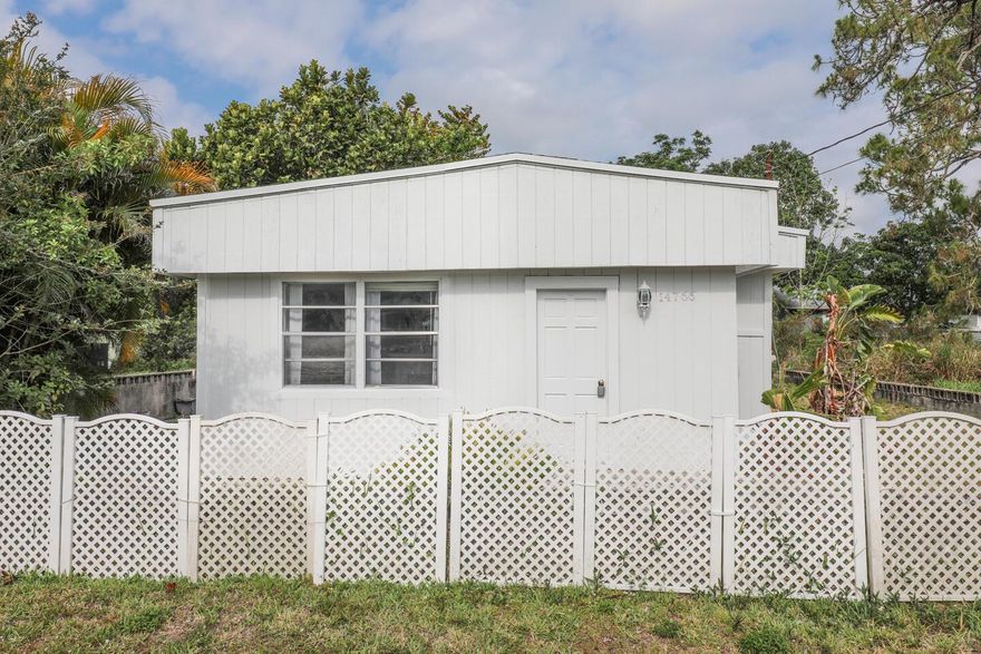 Charming 4-bedroom, 1-bath cottage in the heart of Indiantown, FL! This move-in ready home features a new roof, fresh interior and exterior paint, new closet doors, updated electrical, and new flooring throughout. A perfect blend of comfort and simplicity, featuring a cute living area, a bright kitchen, and a yard with room to relax or garden. Ideal for families, first-time buyers, or investors. A rare find with great potential--don't miss this opportunity!