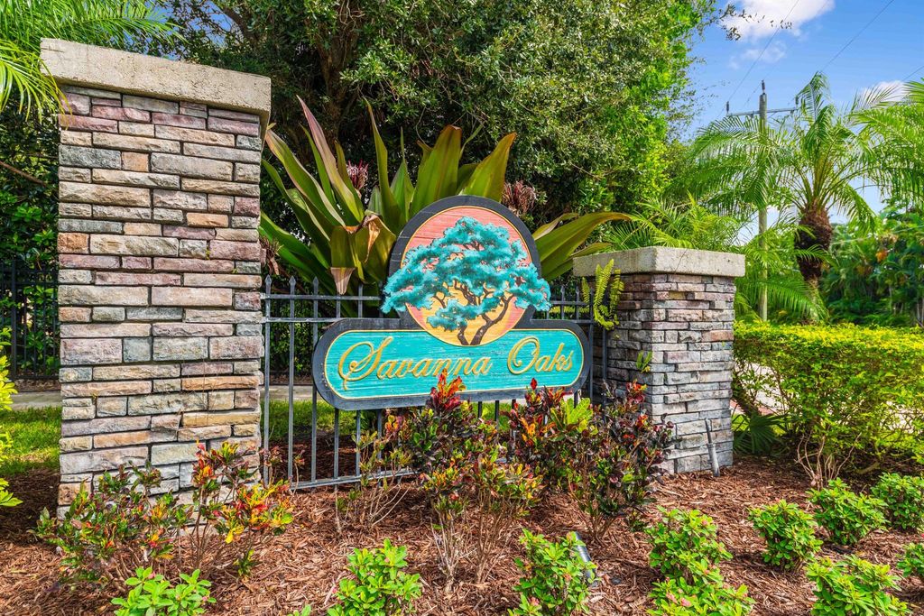 Photo of 1027 NE Savannah Oaks Way, Jensen Beach, FL 34957 (MLS # R11011032)