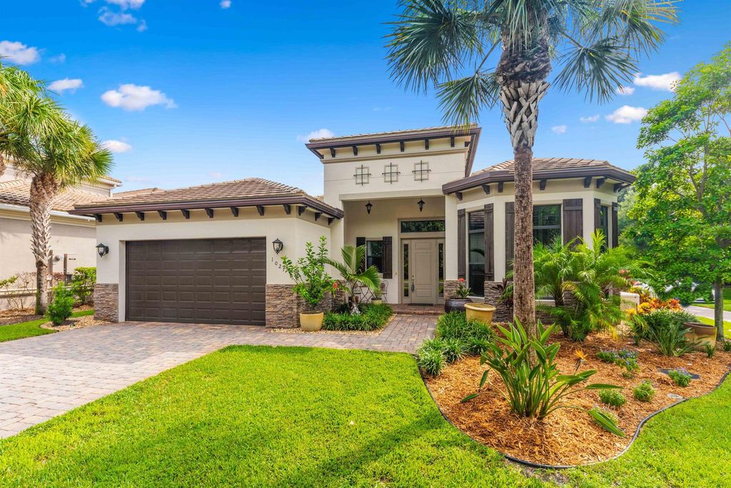 Photo of 1027 NE Savannah Oaks Way, Jensen Beach, FL 34957 (MLS # R11011032)