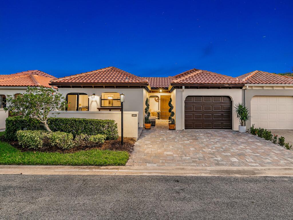 Enjoy JUPITER BEACH living at its finest in this COMPLETELY RENOVATED beachside bungalow in Via Del Mar. This STUNNING and IMMACULATE property feels spacious and truly lives like a single-family home! Your BEAUTIFUL new home features 2 bedrooms, 2 bathrooms, and just under 1,600 square feet of living space! Boasting THREE outdoor patios, a BRAND NEW ROOF, IMPACT windows throughout, 1-car garage, BRAND NEW kitchen and stainless steel Frigidaire appliances AND, if you didn't think this home could get any better, it is located only .2 miles FROM THE BEACH!As you step into your RADIANT new residence, you will notice the GORGEOUS luxury vinyl flooring throughout the entire home and how it effortlessly flows into the OPEN and spacious living areas. You have two LARGE living areas with an
