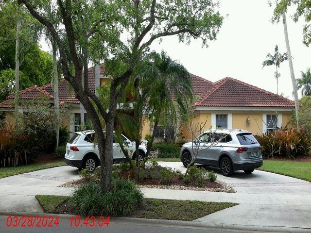 Discover your rental home in sunny South Florida! This stunning 5-bedroom, 4-bath pool residence with a 19000 square foot lot is waiting for you. Enjoy lake views from nearly every room, providing a serene backdrop for everyday living. The spacious floor plan features living and dining areas ideal for entertaining. Step outside to your private backyard oasis with a pool, perfect for relaxing or hosting gatherings. Located close to vibrant shopping centers, top rated schools, major highways for easy commuting, and pristine beaches, this home combines convenience with tranquility. Don’t miss your chance to rent this exceptional property—schedule your private tour today!