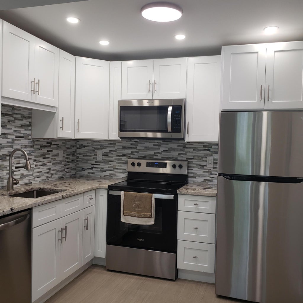 Photo of 912 Flanders S, Delray Beach, FL 33484 (MLS # B26076893)