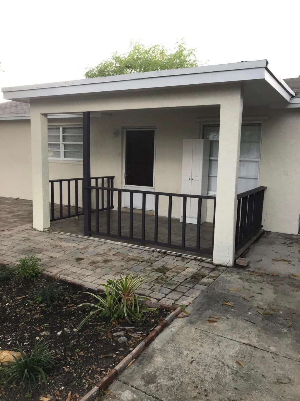 Photo of 1200 W 33RD Street E, Riviera Beach, FL 33404 (MLS # B26092597)