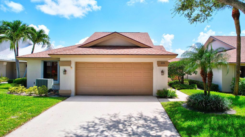 Photo of 315 Ridge Road, Jupiter, FL 33477 (MLS # R11007901)
