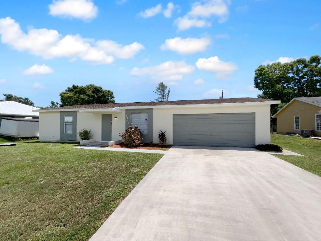 Photo of 1541 SW Curry Street, Port Saint Lucie, FL 34983 (MLS # R11082810)