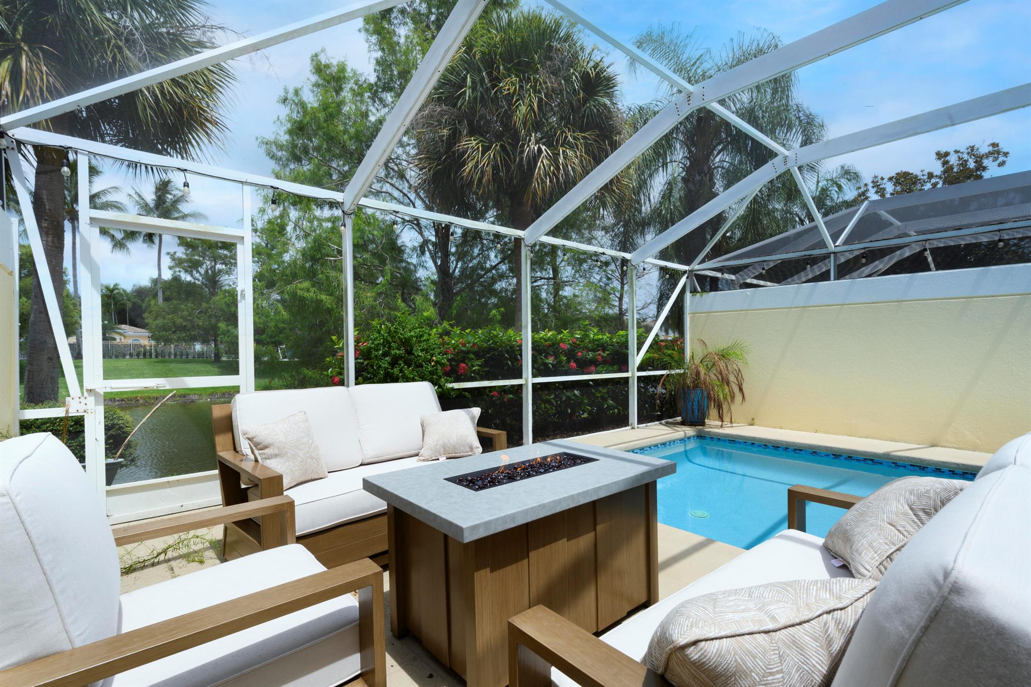 Nestled in the heart of Palm Beach Gardens, this exquisite property offers a perfect blend of luxury and comfort. Featuring three spacious bedrooms and two and a half bathrooms, the home caters to both annual and seasonal renters. Imagine unwinding in your heated pool with a screened in lanai or simply enjoying the tranquil pond view right from your patio. The home is elegantly fully furnished, with brand new appliances, ensuring a seamless move-in experience. Beyond your private oasis, the community offers a host of amenities including an expansive pool and tennis courts, perfect for recreation and relaxation. Golf enthusiasts will appreciate the property's proximity to renowned golf courses, while the golden sands of Juno Beach and Singer Island are just a short drive away.