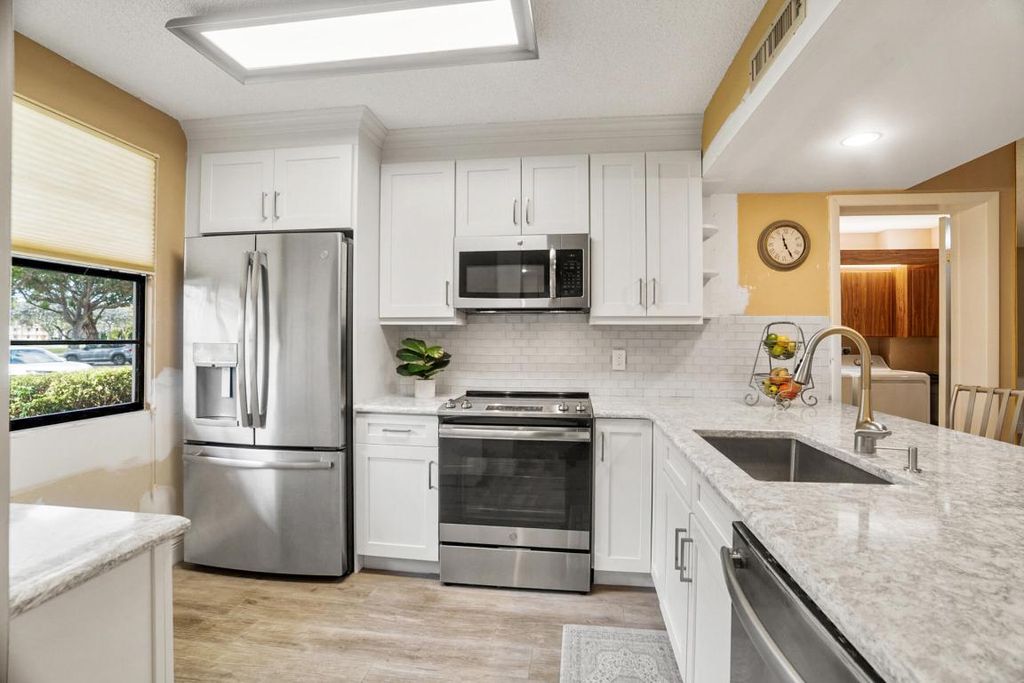 Photo of 6061 Balboa Circle #102, Boca Raton, FL 33433 (MLS # R11146819)