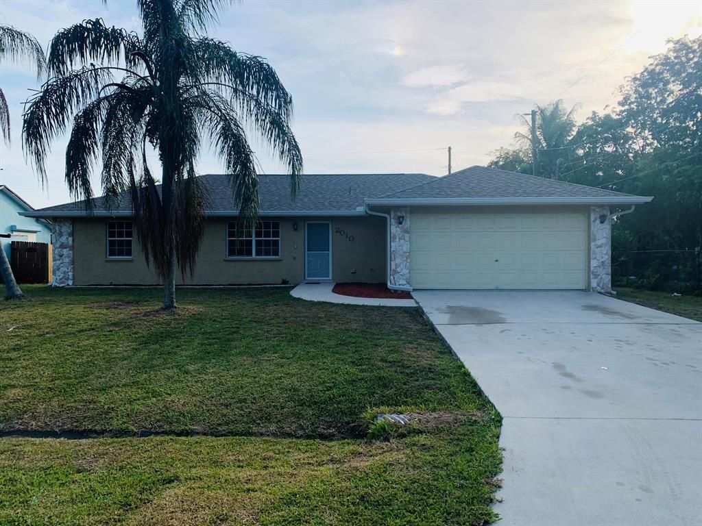 Photo of 2010 SE Camilo Street E, Port Saint Lucie, FL 34953 (MLS # R10715327)