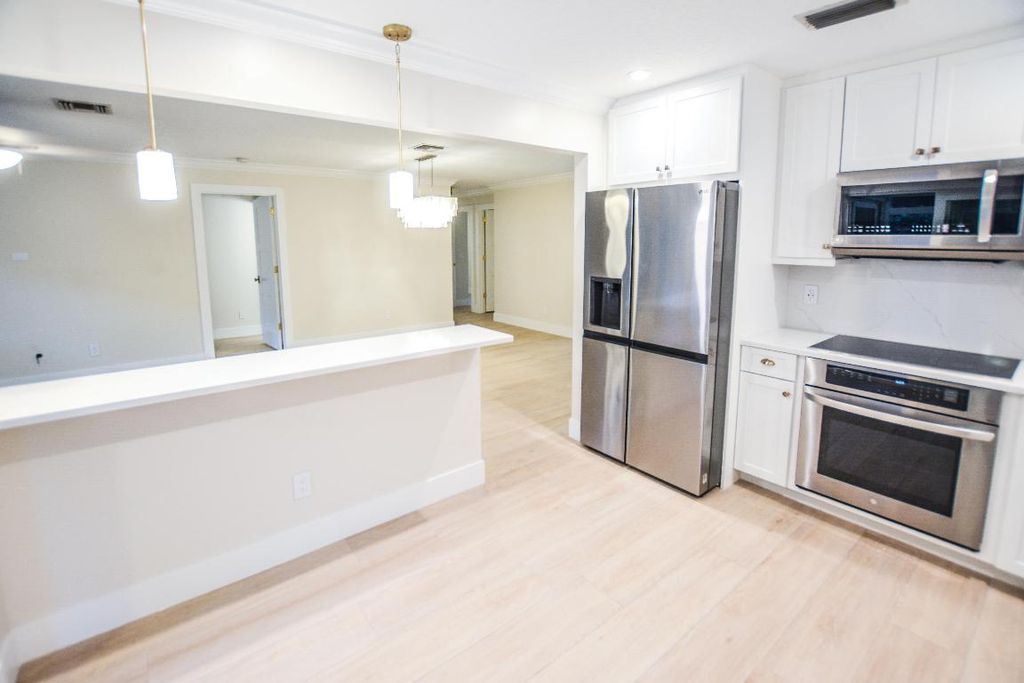 Photo of 226 Moccasin Trail W, Jupiter, FL 33458 (MLS # R10966646)