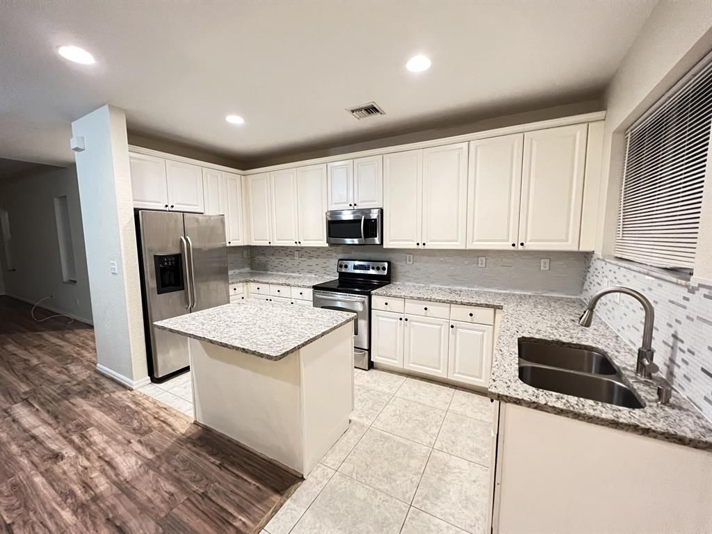 Photo of 2081 SE Avon Park Drive, Port Saint Lucie, FL 34952 (MLS # R10757667)