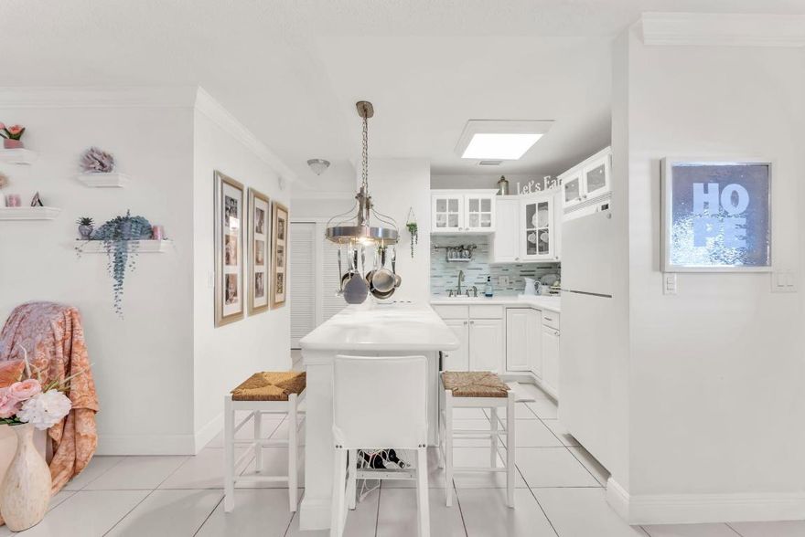 Come see this spacious, meticulously kept, fully furnished turnkey home in Lighthouse Point. This home features an updated kitchen, neutral tile floors, central A/C, and an expansive florida room that can be used as 2nd bedroom. This friendly, active 55+ community has a heated pool, clubhouse, shuffle board and other amenities. Located East of US1, it is a short drive to the beach and close to grocery shopping, restaurants, post office and more.