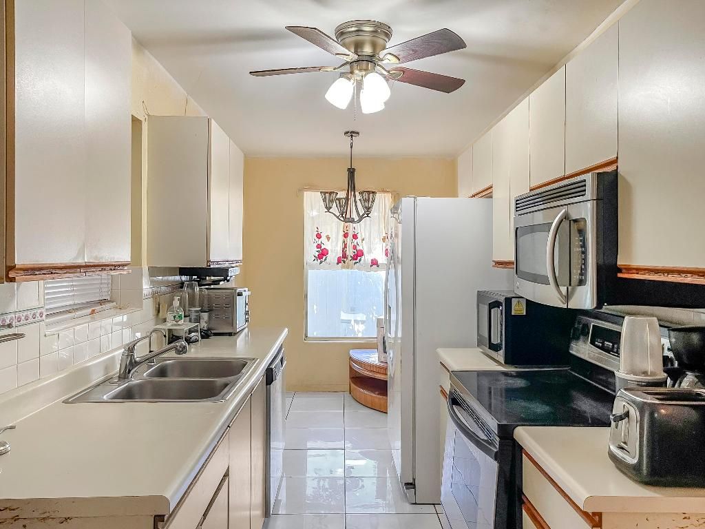 Photo of 6058 Bania Wood Circle, Lake Worth, FL 33462 (MLS # R11142954)