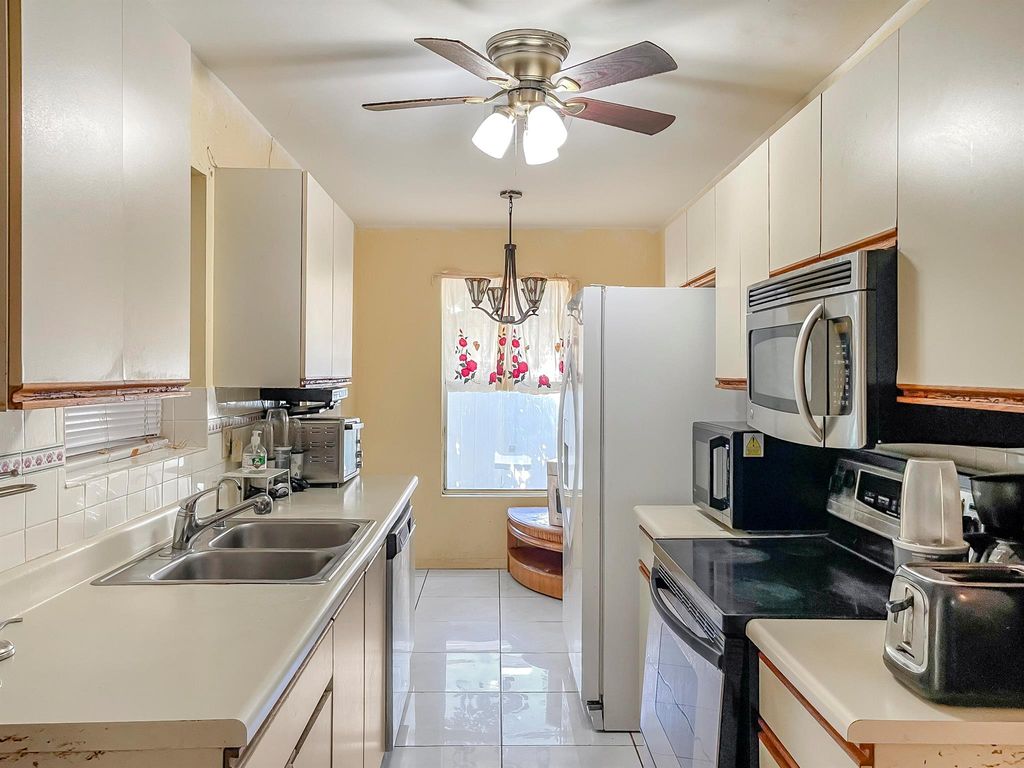 Photo of 6058 Bania Wood Circle, Lake Worth, FL 33462 (MLS # R11142954)