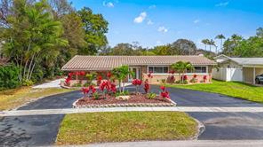 Photo of 5581 SW 13th St, Plantation, FL 33317 (MLS # B26000829)