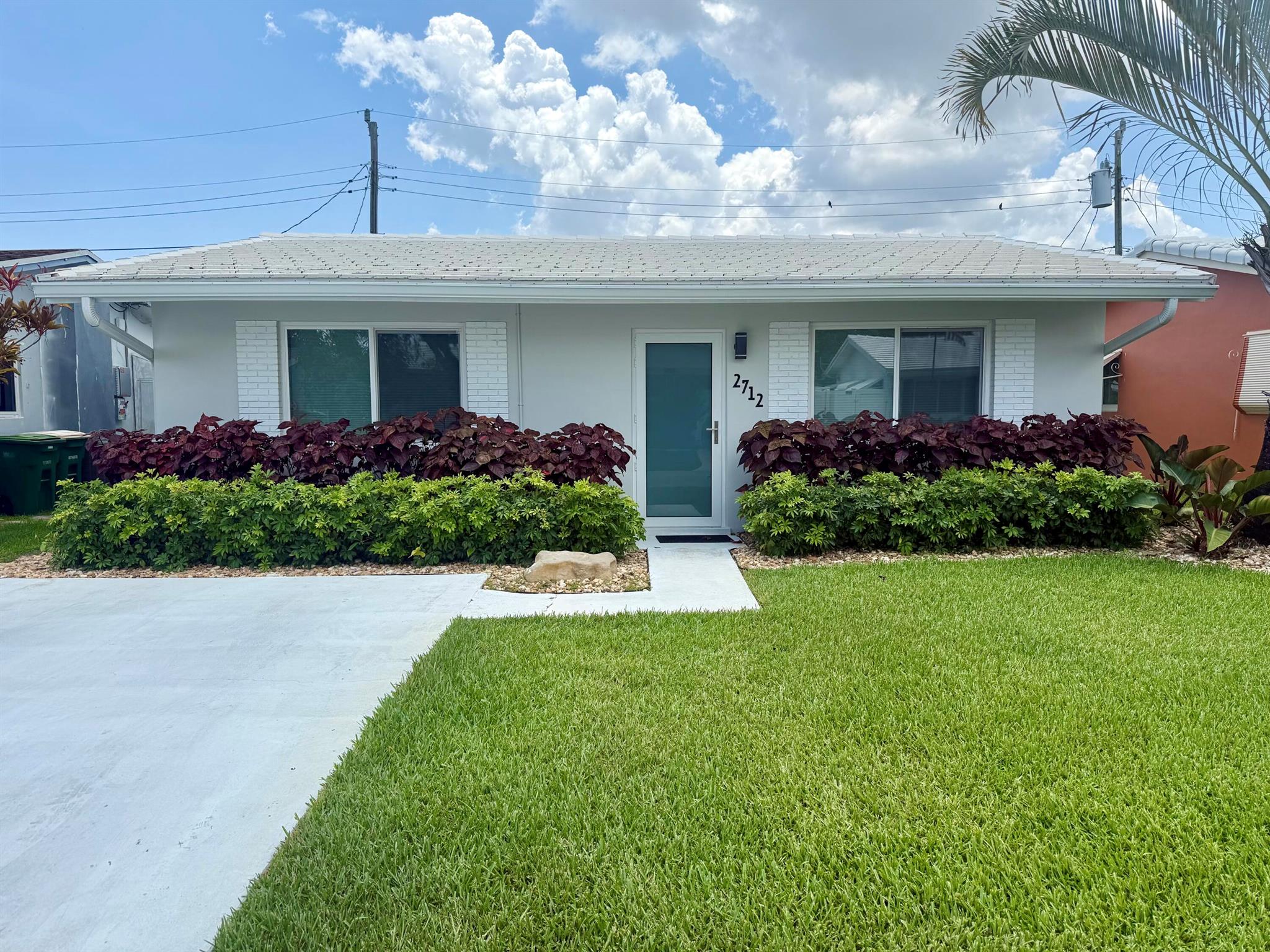 Welcome Home to this beautiful 2 Bedroom 1 Bath with Florida Room Single Family Home. Florida Room can easily be converted to a 3rd Bedroom. Located in the highly sought out community of Tamarac. This turnkey home has been fully updated. Impact Windows & Doors 2018, Roof 2018, Updated Electrical & New Panel 2018, Tankless Water Heater 2025, Bathroom Remodeled 2024, Kitchen Remodeled 2024, Exterior Paint 2025, Interior Paint 2024, Recessed Lighting 2024, Floors 2024, Landscaping 2024, Appliances 2024, Custom Interior Blinds 2024, Master Closet Built In Shelves 2024. Home also comes equipped with an EV Charger. This is a must see... Call for your private showing today.