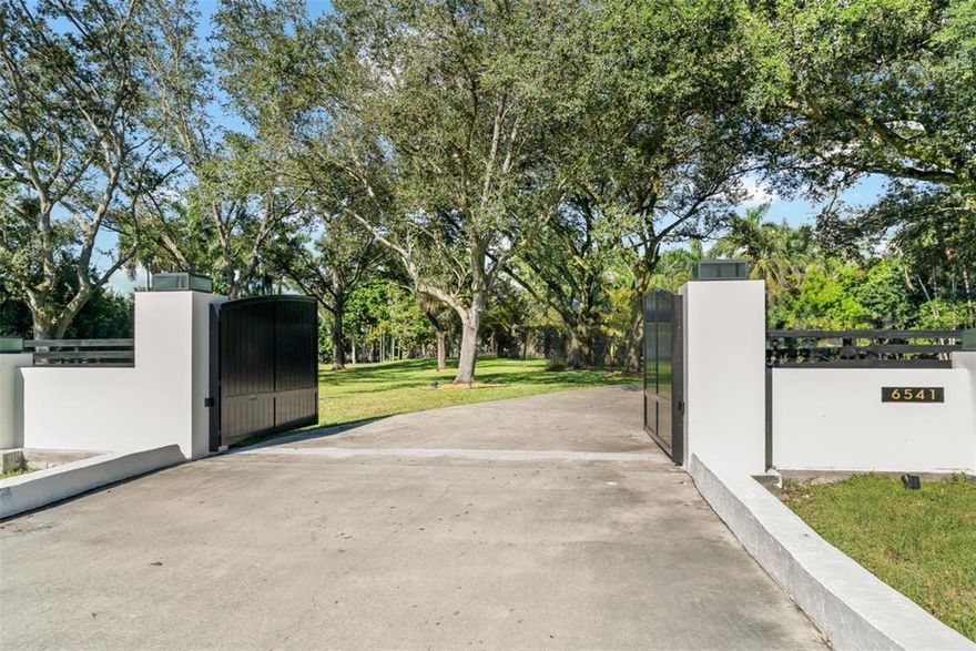 PRIME Southwest Ranches Opportunity! This exceptional 3.25-acre corner lot, perfectly positioned at Melaleuca Road and Luray Road, offers an unparalleled canvas for your dream estate. Enter through a private, gated entrance framed by majestic mature oaks, setting the tone for the exclusivity within. Located in one of Broward County’s most coveted and fastest-growing luxury enclaves—home to elite athletes, entertainers, and top-tier executives—this property is a rare find in a market with virtually no supply of premium buildable lots. Unlike most parcels in the area, this property is being upgraded with city water access—saving time and expense—and that installation is nearing completion. Architectural and engineering plans for a custom estate are available to qualified purchasers.