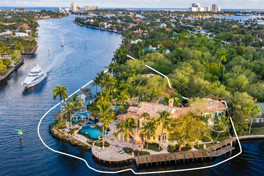 BIDDING IS NOW OPEN! NO RESERVE AUCTION May 14 Ending May 18. Known as Tarpon Pointe, this iconic waterfront estate is the heart of Fort Lauderdale, the yacht capital of the world.  590 feet of prime riverfront to accommodate a 138 foot mega yacht.  Property offers 1.41 acres of meticulous landscaping in a private park-like estate and resort-style pool overlooking both New & Tarpon Rivers. Point lot. Unparalleled views of the riverbend and the skyline of Fort Lauderdale. Property can potentially be subdivided for up to 4 buidable lots each with approximately 150 Feet of Waterfrontage.