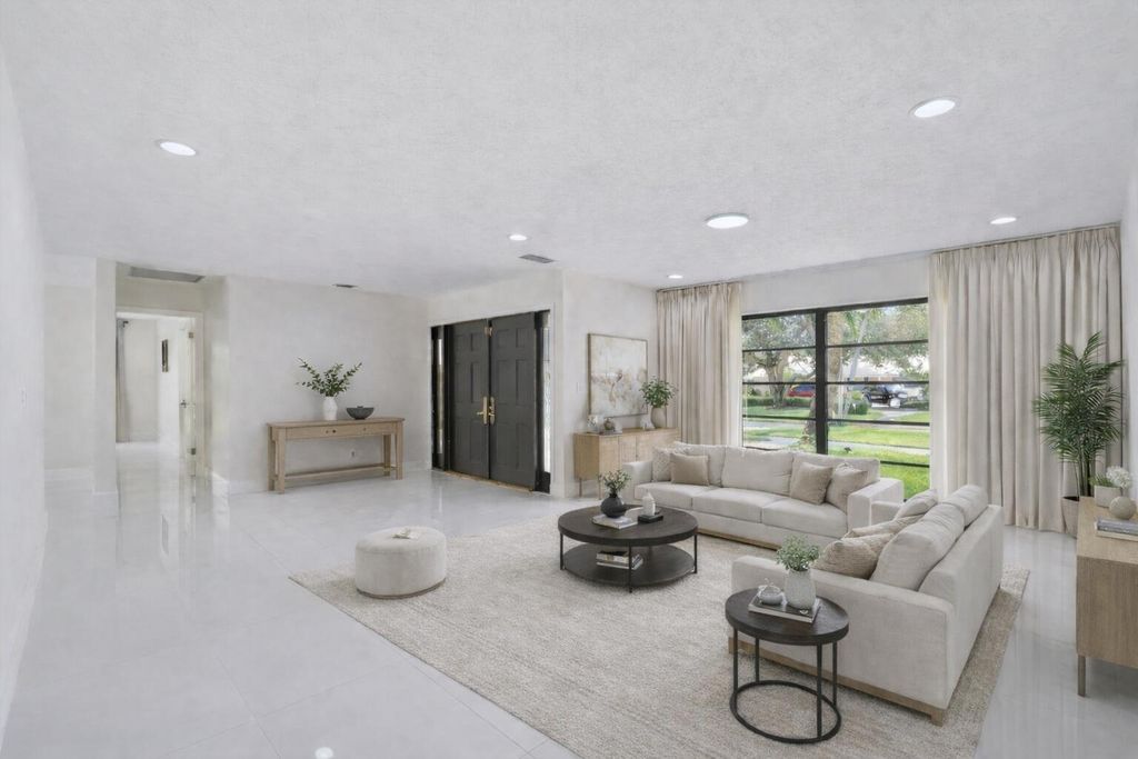 Photo of 516 Muirfield Drive, Atlantis, FL 33462 (MLS # R11158188)