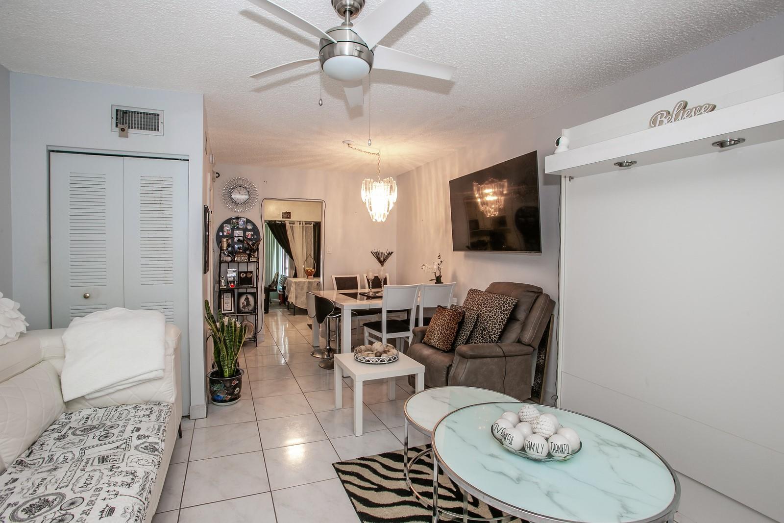 Look at this amazing 2nd flr 1 Bed/1.5 Bath Updated condo in Oriole Gardens. Amazing location with pool view. Private balcony perfect for enjoying the peaceful setting. Turnkey unit... just bring your suitcase. This condo has recent installation of bathroom cabinets, mirrors and light fixtures. Beautiful white tile flooring throughout condo. Plenty of room in Master bedroom closet. Custom Designed Sofa w/ Built-in Murphy Bed easily converts this beautiful living room into a 2nd bedrm (which will be removed by seller. Next to unit is laundry rm/ Storge. Assoc fee incl basic cable & water. Call this beautiful condo your next home!! a 55+ Community offers many activities: such as pool, bbque, shuffleboard, exercise room, and billard. Unit is a short distance from Pool and club house.