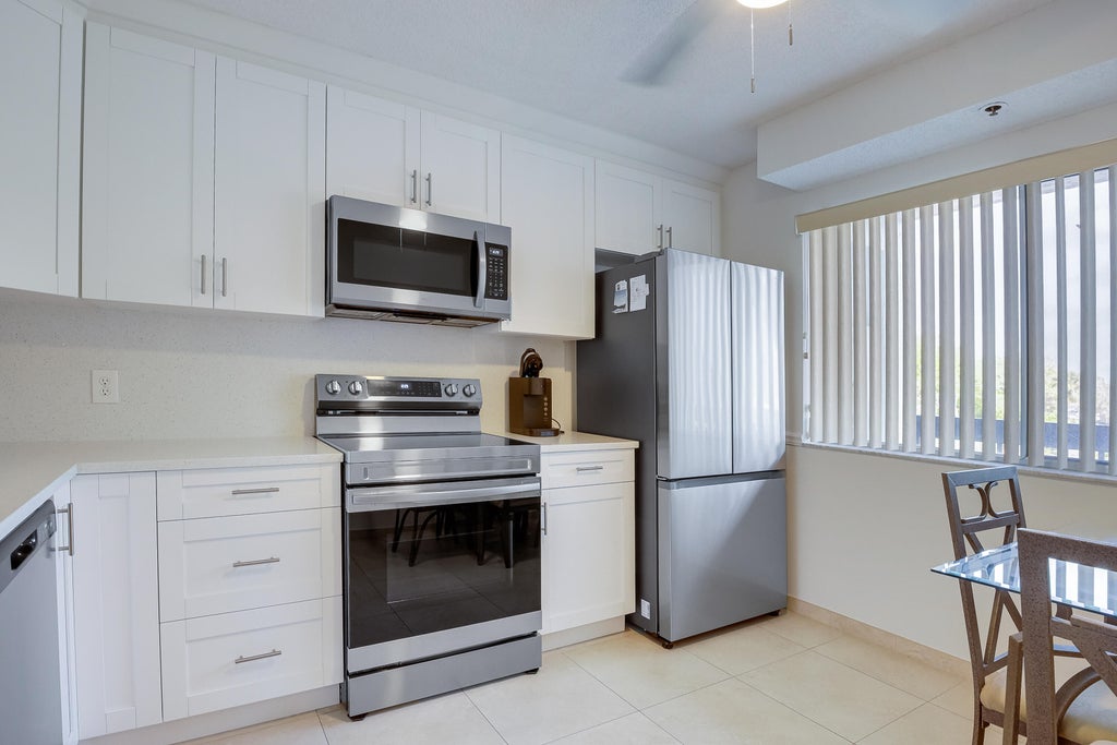 Photo of 6698 10th Avenue N #601, Greenacres, FL 33467 (MLS # B26059865)