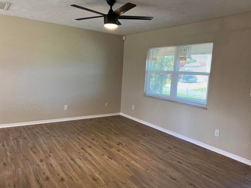 Photo of 450 SW Dagget Avenue SW, Port Saint Lucie, FL 34953 (MLS # R10965331)