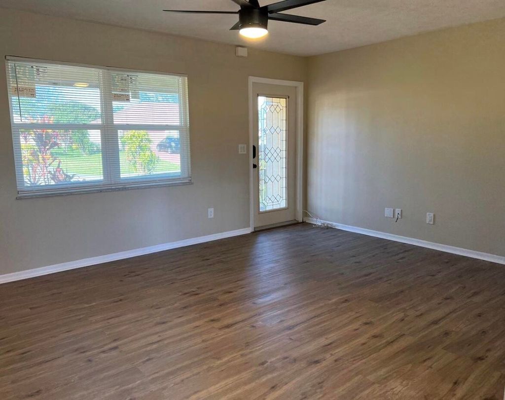 Photo of 450 SW Dagget Avenue SW, Port Saint Lucie, FL 34953 (MLS # R10965331)