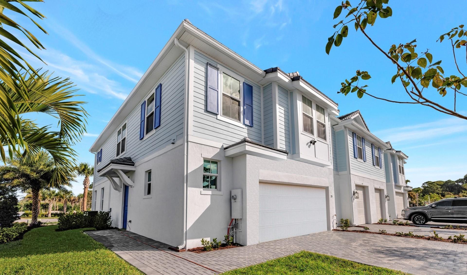 Location, Location, Location. Beautifully designed coastal style townhome Professionally Interior Designed FURNISHED Model Home. Corner unit with open floor plan, lots of natural light, beautiful high end upgraded finishes, Gourmet Kitchen with Double Oven, Impact Windows, Impact Doors, and much more plus a 2 Car Garage with lots of extra parking spaces (A Rarity). Paver driveway, and patio. Within walking distance to the beautiful refreshing pool. Excellent Martin County School District. Approximately 7 min to historic downtown Stuart, 7 min to downtown historic Jensen Beach. Approximately 10 min to the beautiful Atlantic Ocean Beach. Square footage and pool dimensions are approximate.