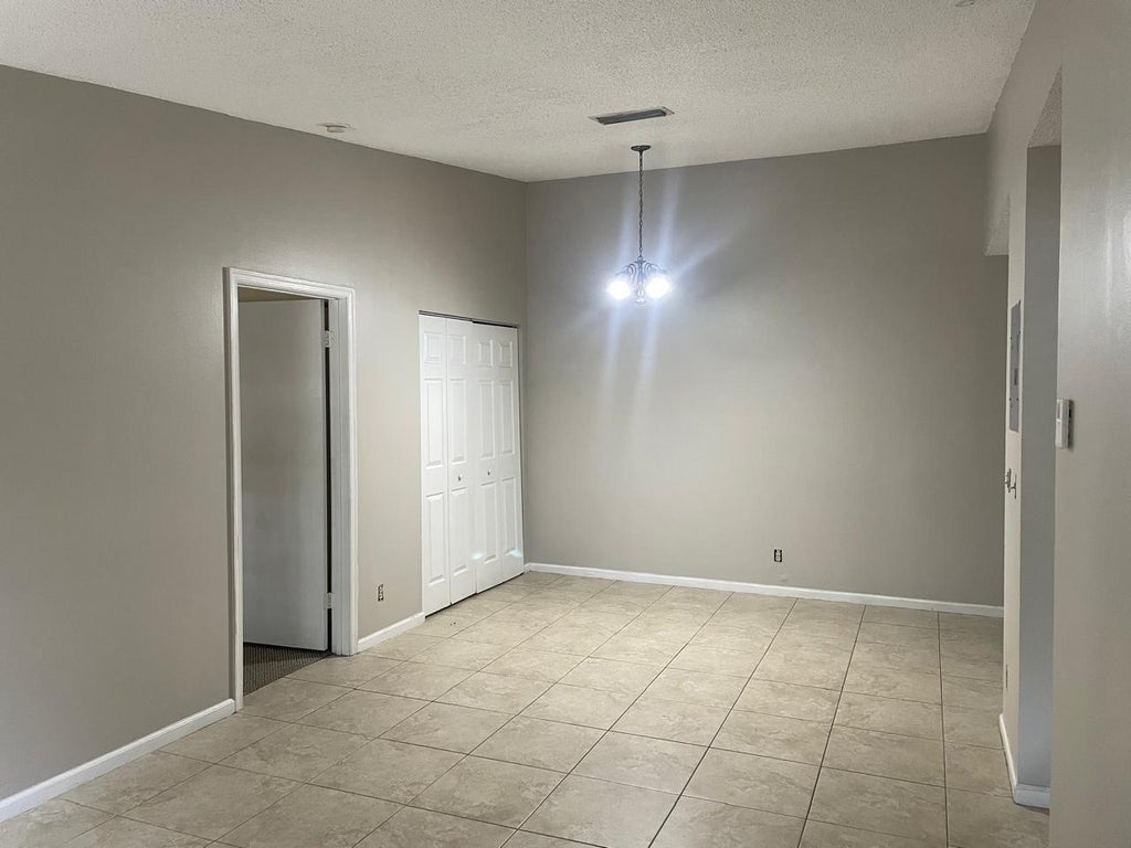 Photo of 5070 Sanctuary Way #F, West Palm Beach, FL 33417 (MLS # R11096575)