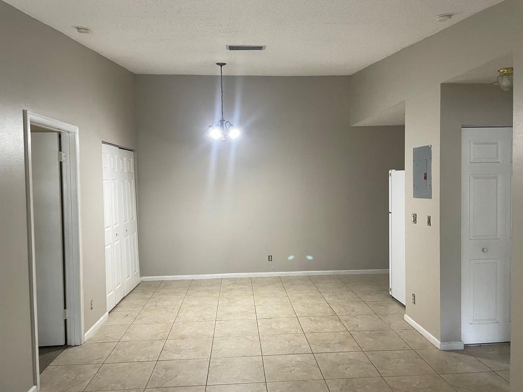 Photo of 5070 Sanctuary Way #F, West Palm Beach, FL 33417 (MLS # R11096575)
