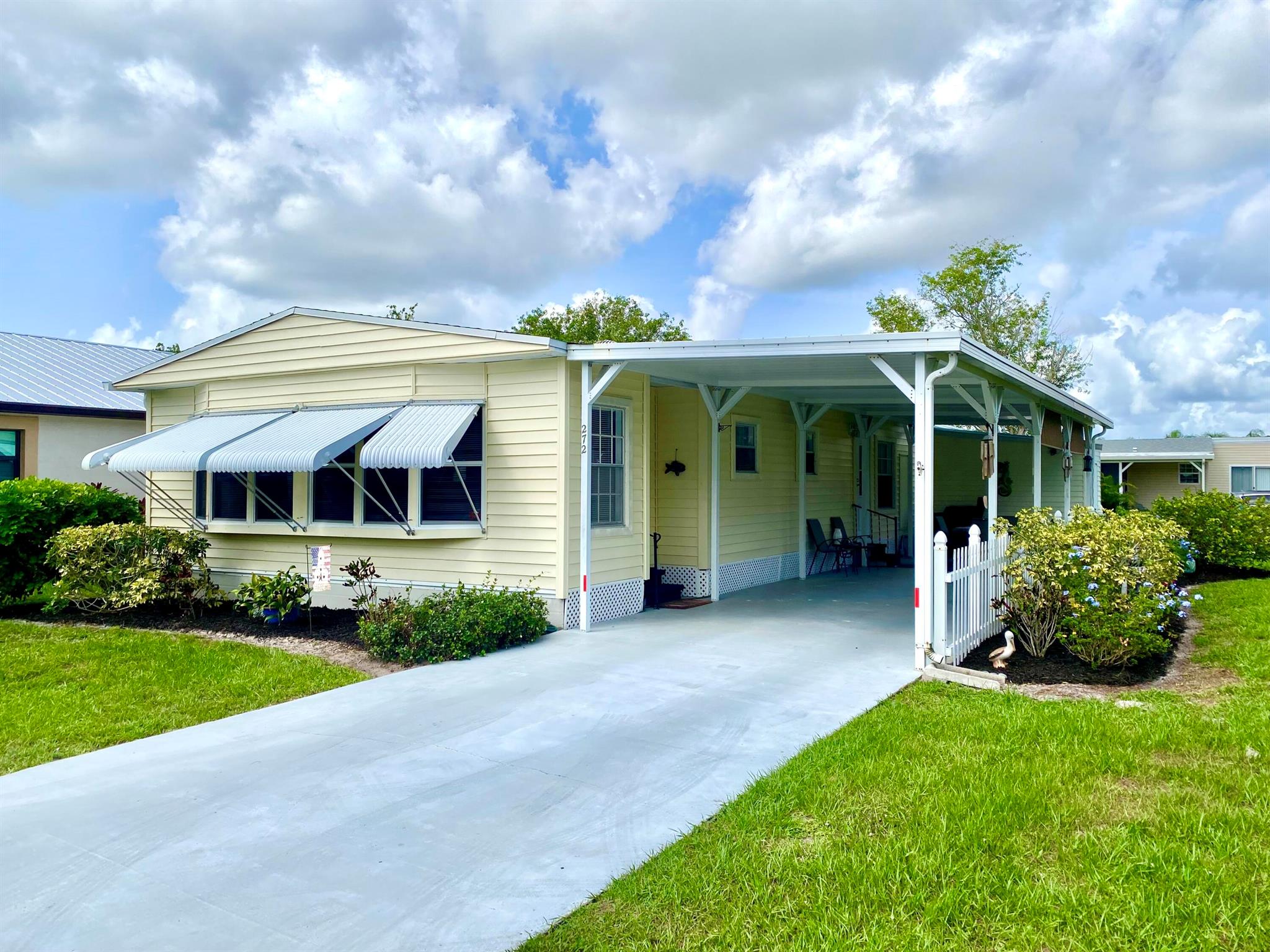 Move-in ready home conveniently located on a corner lot at the beginning of the neighborhood. Bright and inviting with crisp white walls throughout. Washer/Dryer located in huge walk-in master closet makes laundry a breeze. Large, open living area with furnishings available. Nice landscaping and extra storage available in shed. Large covered carport with pull down shades & big enough for two vehicles. All information to be verified by the buyer.