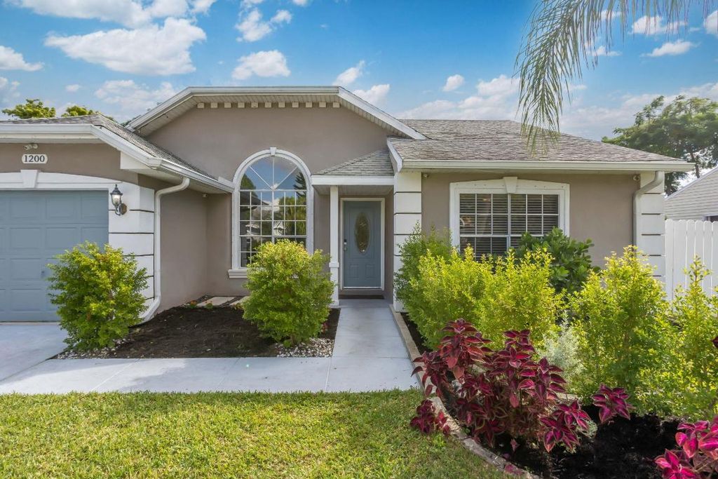 Photo of 1200 Grandview Circle, Royal Palm Beach, FL 33411 (MLS # R11134964)