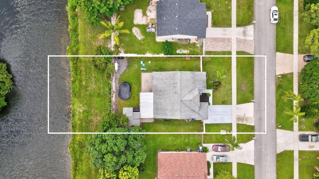 Photo of 1200 Grandview Circle, Royal Palm Beach, FL 33411 (MLS # R11134964)