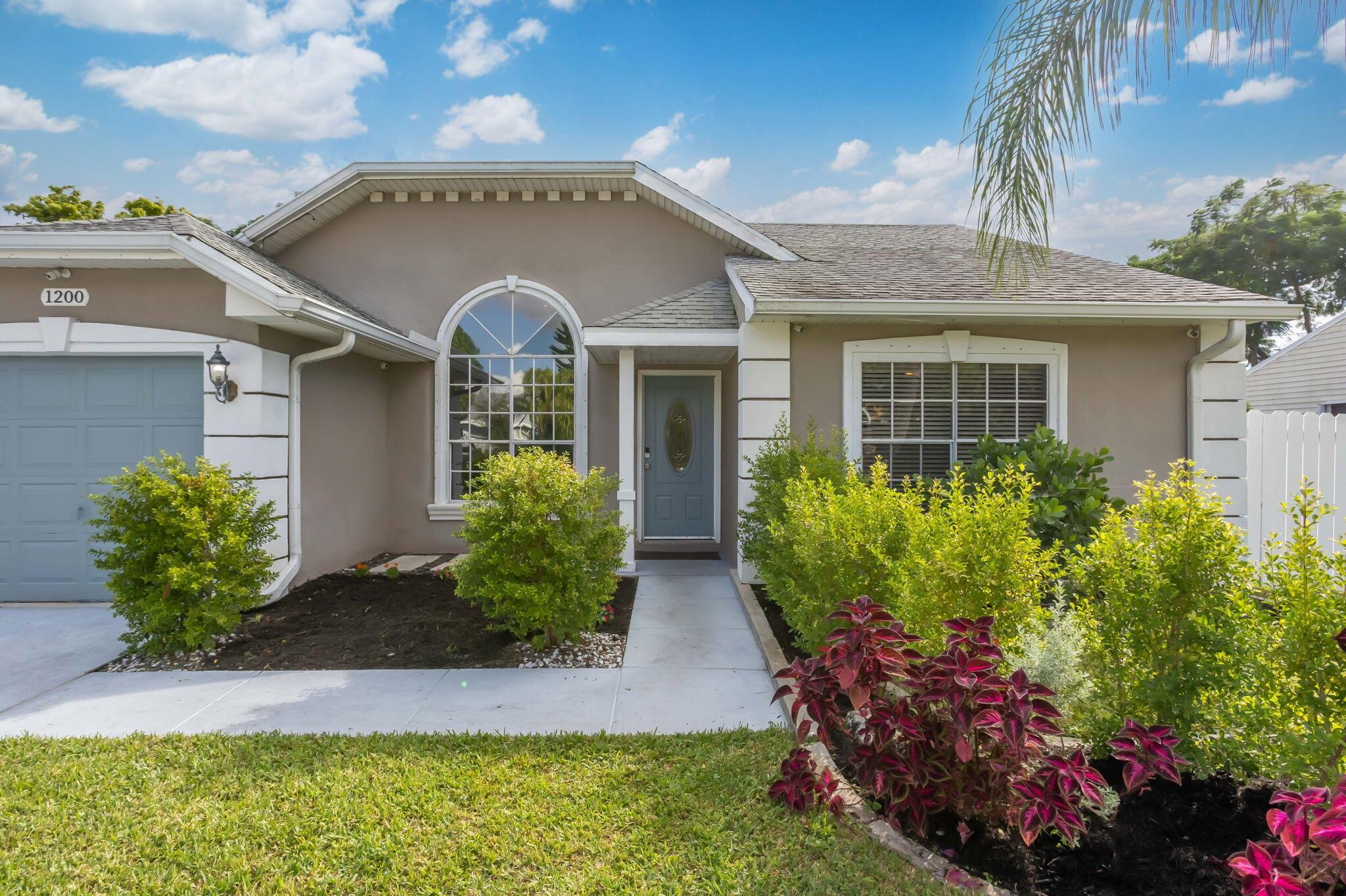 Discover effortless South Florida living in this beautifully maintained home with no HOA and no rear neighbors. Featuring a light, open layout with granite countertops and warm wood-tone floors, this home blends comfort and style in all the right ways. Enjoy evenings on your screened patio or take a dip in your above-ground pool surrounded by a fully fenced yard.This updated home offers peace of mind and everyday ease--with some newer major appliances.