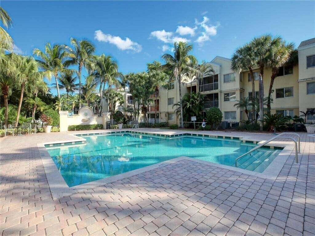 Photo of 5672 ROCK ISLAND Road #249, Tamarac, FL 33319 (MLS # B26075103)