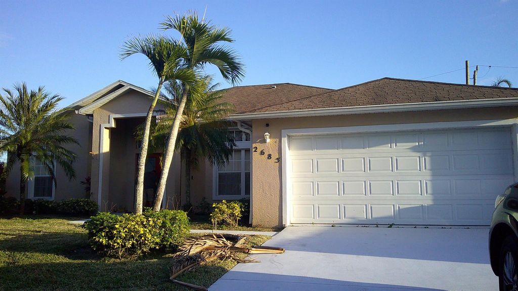Photo of 2685 SW Selkirk Lane, Port Saint Lucie, FL 34953 (MLS # R10953890)