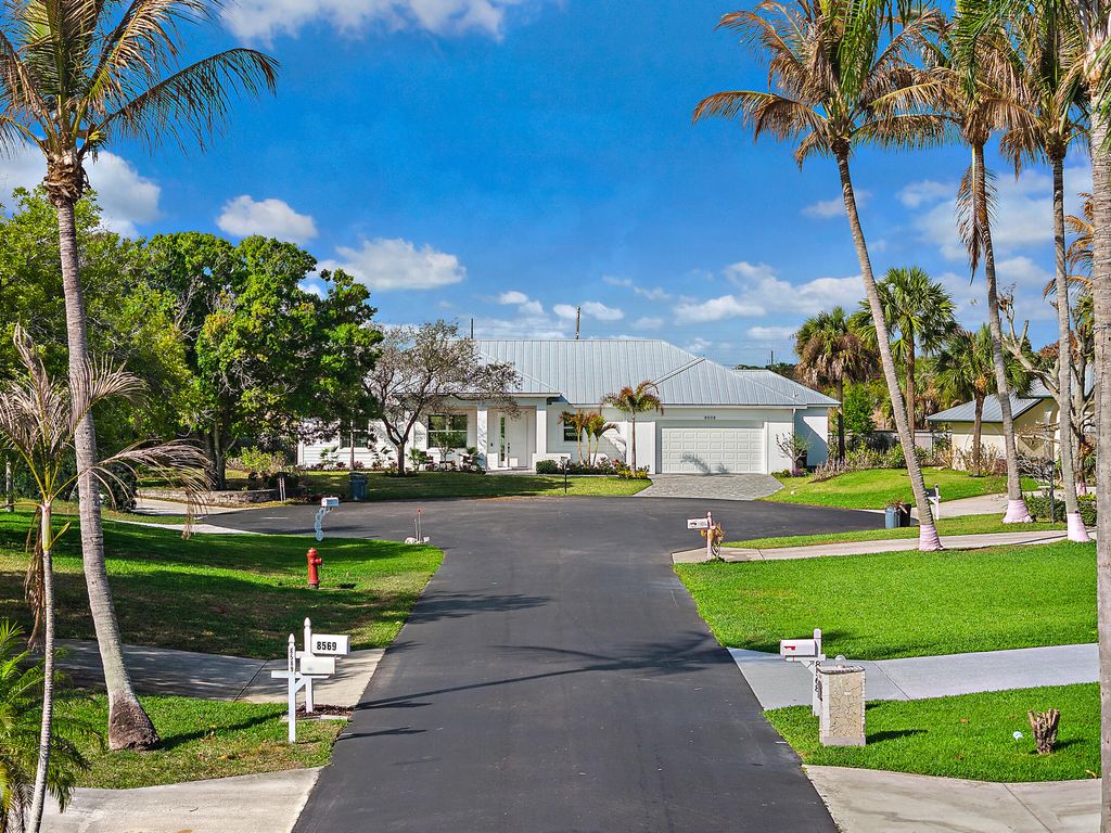 Photo of 8508 SE Woodwind Street, Hobe Sound, FL 33455 (MLS # B26001810)