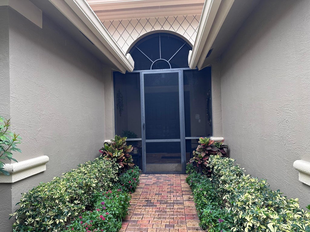 Photo of 8041 E Via Grande, Boynton Beach, FL 33437 (MLS # B26048681)