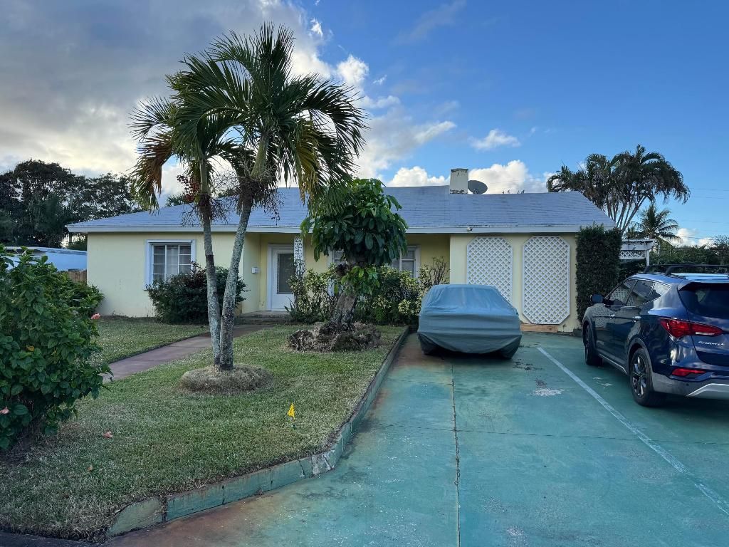 Photo of 352 Ellamar Road, West Palm Beach, FL 33405 (MLS # R11153180)