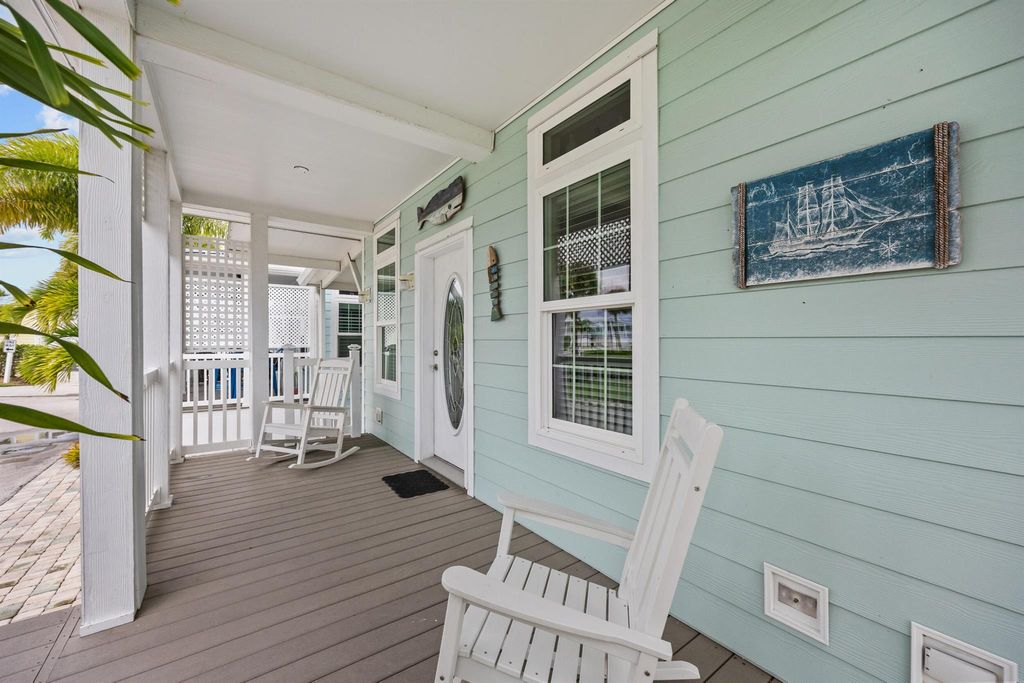 Photo of 204 NE Sail Way, Jensen Beach, FL 34957 (MLS # R11129644)