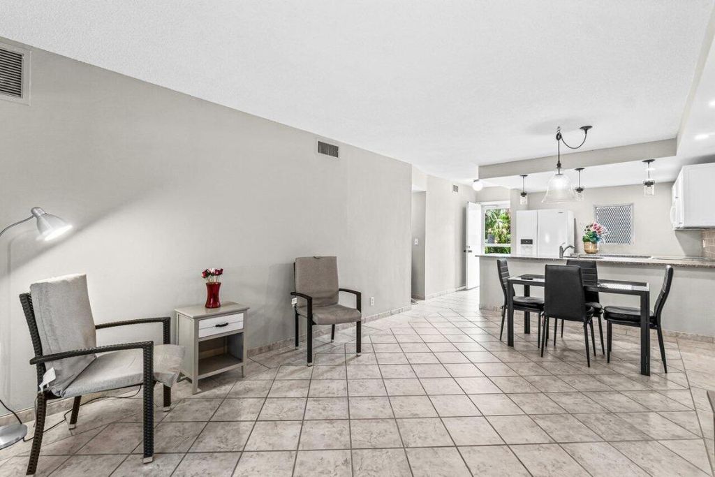 Photo of 2191 NE 1st Court #Apt 106, Boynton Beach, FL 33435 (MLS # R11120385)