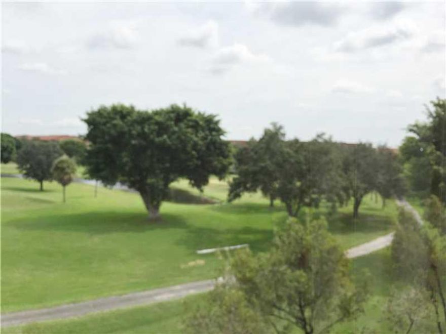 Beautiful Original Owner Well Maintained 2/2 Overlooking Golf Course & Lake, Newer Counters & Built In Microwave in Kitchen, Seller Moving Up North with Family, Bring All Offers.