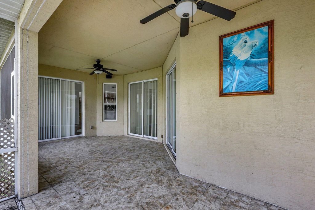 Photo of 3864 SW Wycoff Street, Port Saint Lucie, FL 34953 (MLS # R11001335)