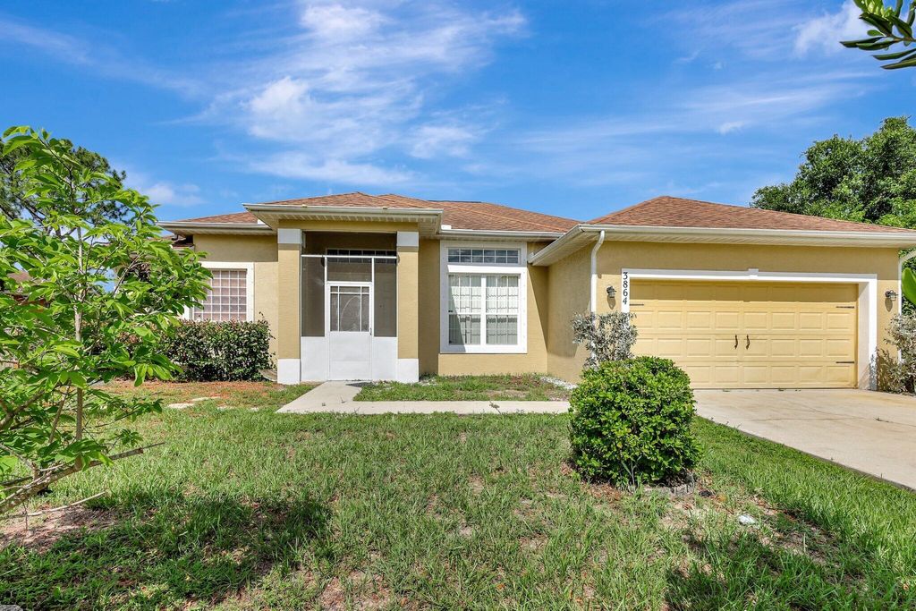 Photo of 3864 SW Wycoff Street, Port Saint Lucie, FL 34953 (MLS # R11001335)