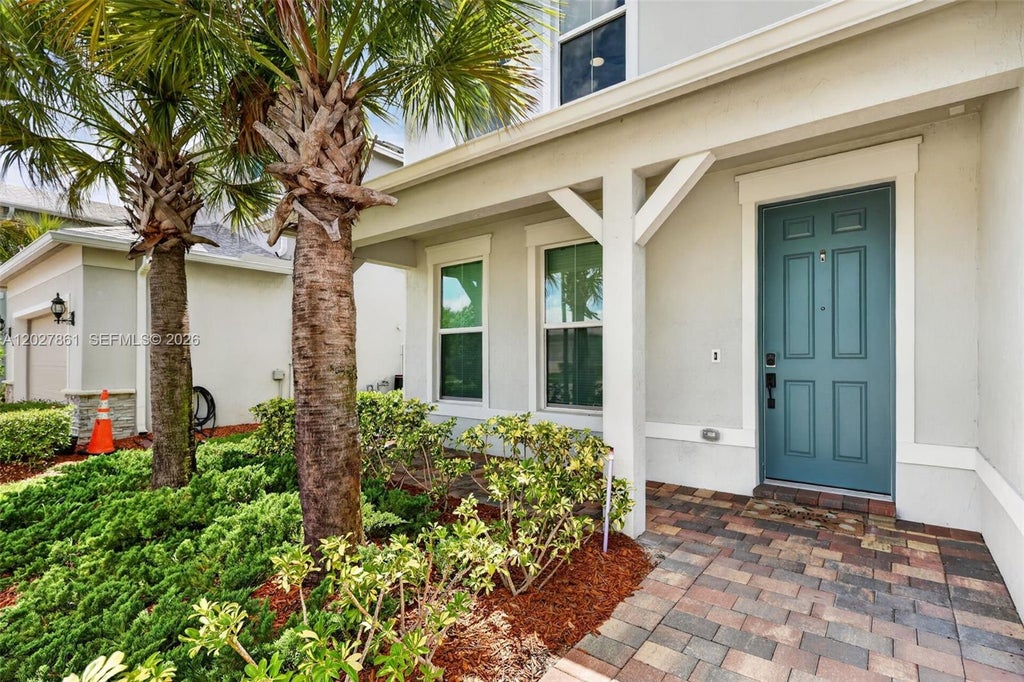 Photo of 12360 SW Myrtle Oak Drive, Port Saint Lucie, FL 34987 (MLS # A12027861)