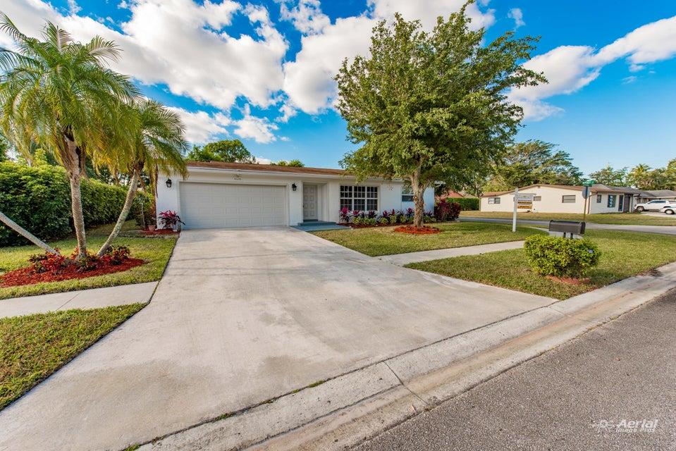 Welcome home to one of the best kept secrets in Delray Beach, Coco-Woods. 2 bedroom, 2 bathroom, 2 car attached garage! RARE LARGE RANCH (1 story) MODEL! VERY pet friendly community featuring this FULLY REMODELED home which has 100% tile throughout! NO CARPETS!! Remodeled in 2018 with over $75,000 worth of upgrades! brand new A/C, Kitchen with authentic quartz countertops, Stainless Samsung premium appliances, HURRICANE IMPACT GLASS windows, and roll down shutters on patio, large back yard, rare over sized corner lot. Active 55+ community with gorgeous pool+amenities. Newer roof, freshly painted inside and out, new bathrooms, premium upgrades and finishes, cedar master closet, FRESHLY LANDSCAPED and new sprinklers! All this home needs is a new owner! HURRY THIS ONE WON'T LAST LONG!!
