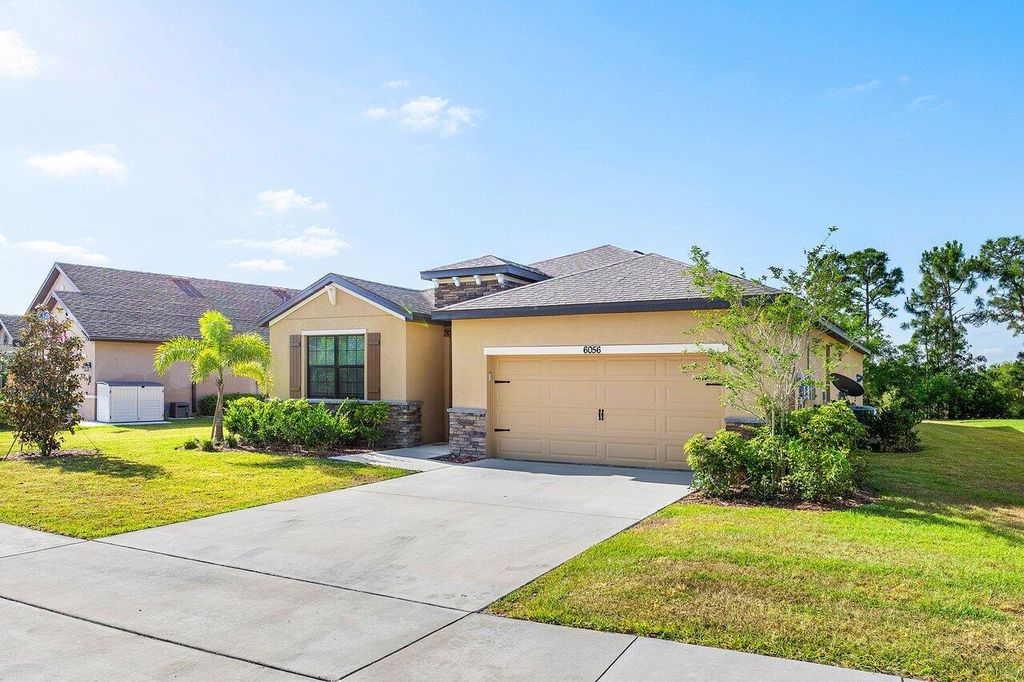 Photo of 6056 NW Regent Street, Port Saint Lucie, FL 34983 (MLS # R11085997)