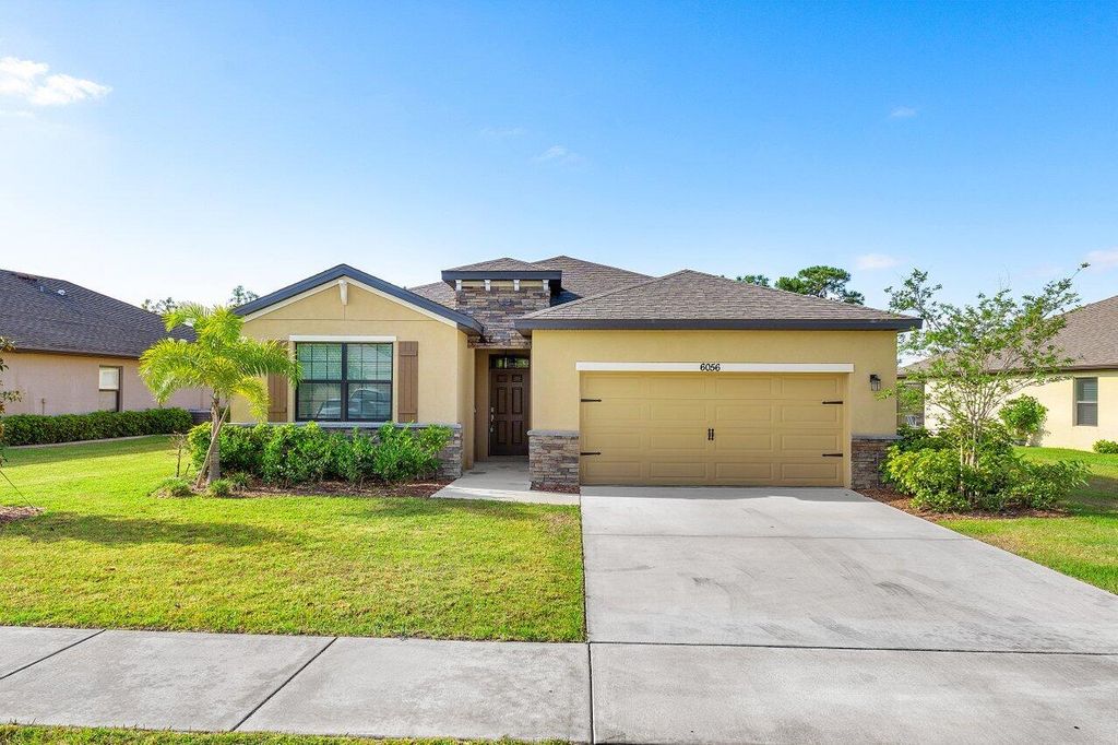 Photo of 6056 NW Regent Street, Port Saint Lucie, FL 34983 (MLS # R11085997)