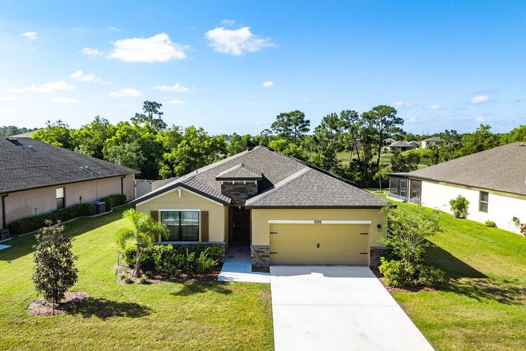 Photo of 6056 NW Regent Street, Port Saint Lucie, FL 34983 (MLS # R11085997)