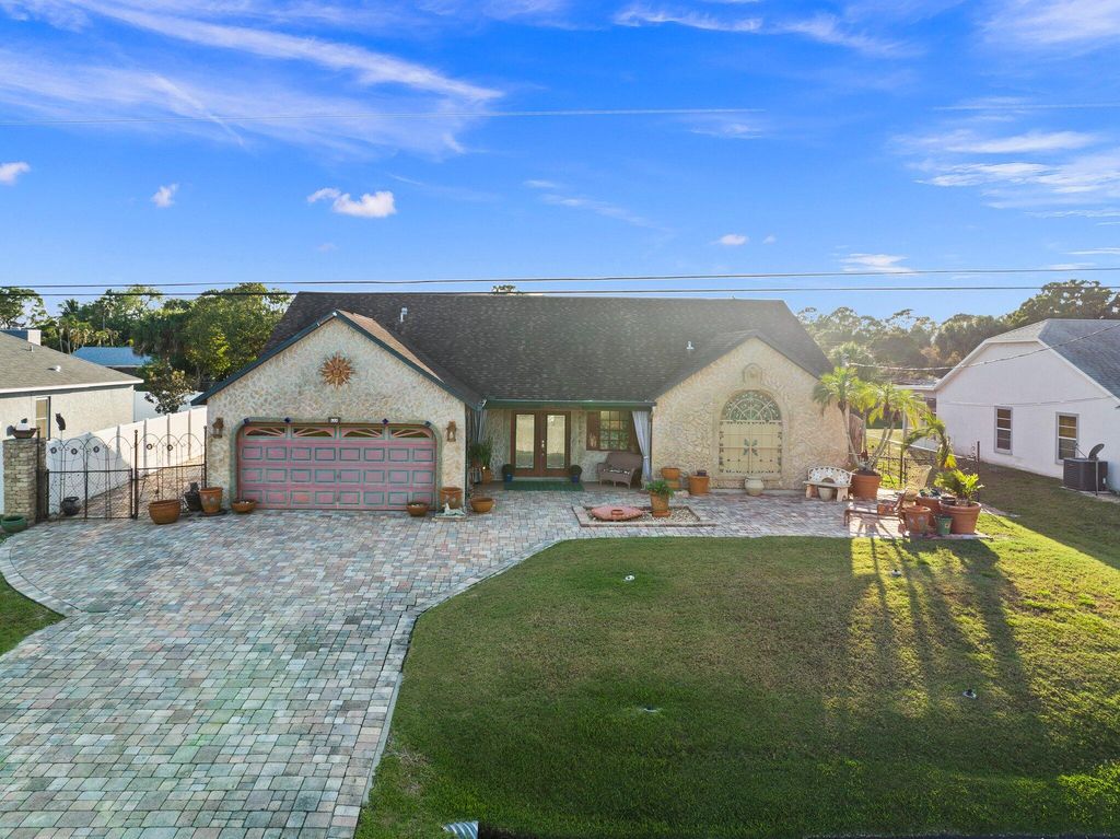 Photo of 668 SW Sansom Lane, Port Saint Lucie, FL 34953 (MLS # R11032420)